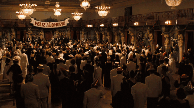 New Year’s Eve celebration scene from The Godfather Part II, showing a crowded ballroom during the New Year festivities.